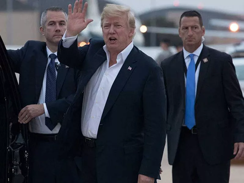 U.S. President Donald Trump yells to reporters after arriving at Andrews
Air Force Base after a summit with North Korean leader Kim Jong Un. (Photo: AP)
