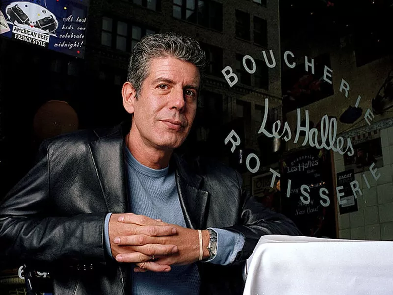 Anthony Bourdain, the owner and chef of Les Halles restaurant, sitting
at one of the tables in New York.