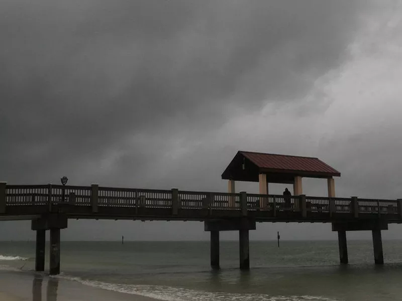 Rain falls on Clearwater Beach by Pier 60 early Sunday morning, as northbound Subtropical Storm Alberto looms in the gulf to the southwest.