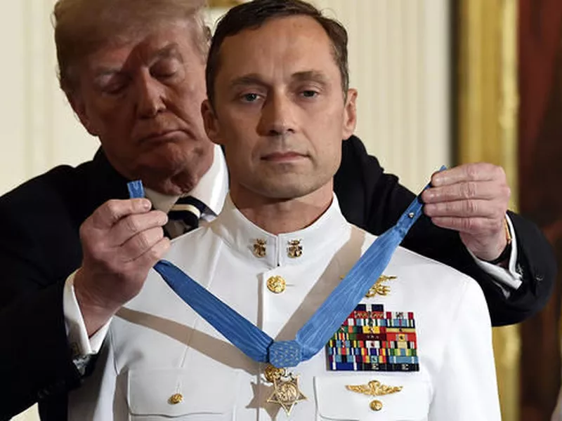 PresiDenT Donald Trump awards the Medal of Honor to Master Chief Special Warfare Operator Britt K. Slabinski. (AP)