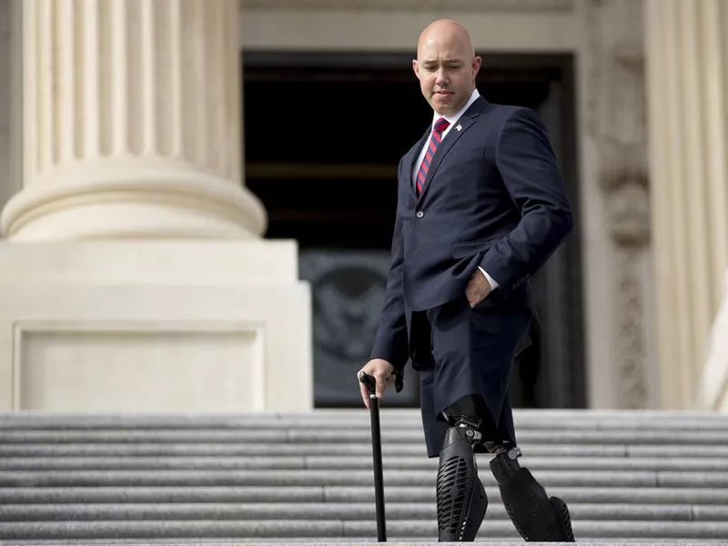 Rep.-elect Brian Mast, R-Fla. departs after newly-elected House members  gathered for a freshman class photo on the Capitol steps.