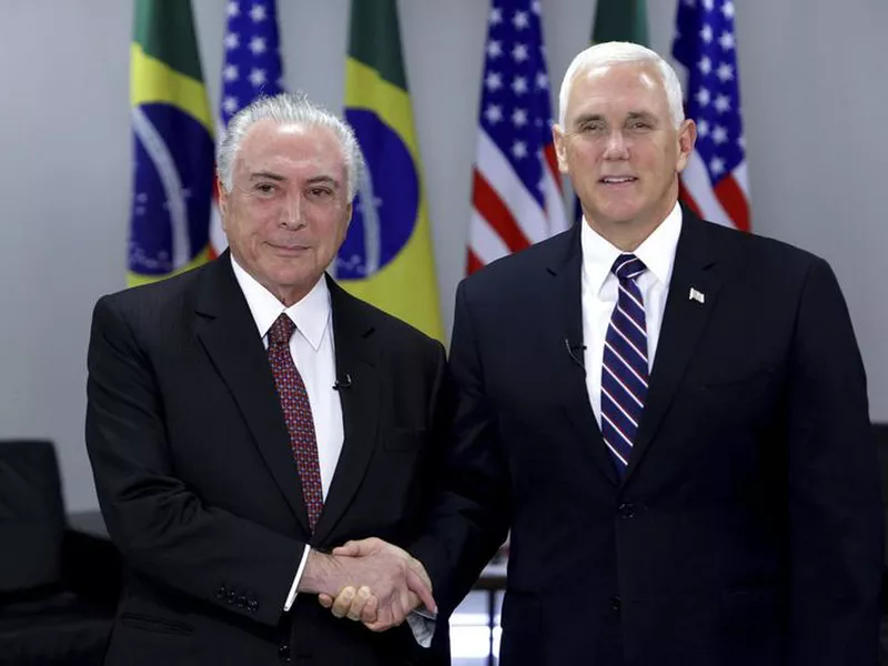 Brazil’s President Michel Temer, left, greets U.S. Vice President Mike Pence at Planalto Palace, in Brasilia, Brazil.