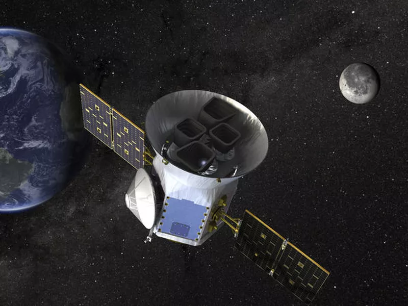 This image made available by NASA shows an illustration of the Transiting Exoplanet Survey Satellite (TESS). Scheduled for an April launch, the spacecraft will prowl for planets around the closest, brightest stars. These newfound worlds eventually will become prime targets for future telescopes looking to tease out any signs of life.