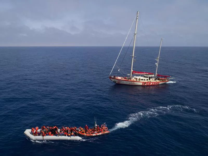 Refugees and migrants are transferred to the SOS Mediterranee Aquarius
rescue. (AP)
