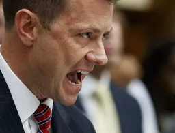 Shouting as fbi agent faces angry republicans