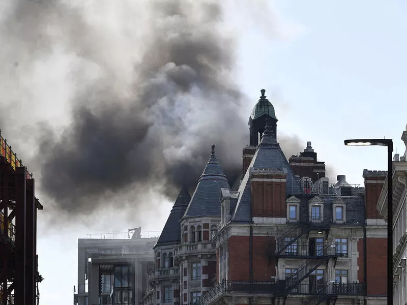 Smoke rises from a building in Knightsbridge, central London, as London
Fire Brigade responded to a call of a fire in this upmarket location.
