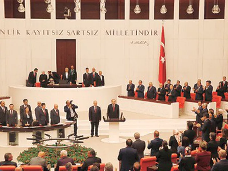 Turkey’s President Recep Tayyip Erdogan, center, speaks at the parliament in Ankara, Turkey, when taking the oath of office for his second term as president.