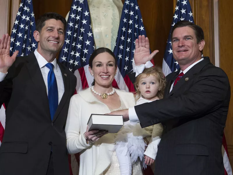 House Speaker Paul Ryan of Wis. administers the House oath of office to Rep. Austin Scott, R-Ga., during a mock swearing in ceremony on Capitol Hill in Washington.