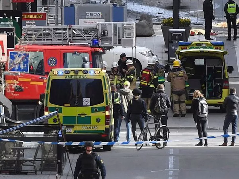 This is a April 7, 2017 file photo, showing emergency services at the scene
of an attack on Drottninggatan street in central Stockholm.