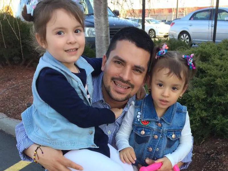 In this undated family photo provided by Sandra Chica, Pablo Villavicencio poses with his two daughters, Luciana, left, and Antonia.