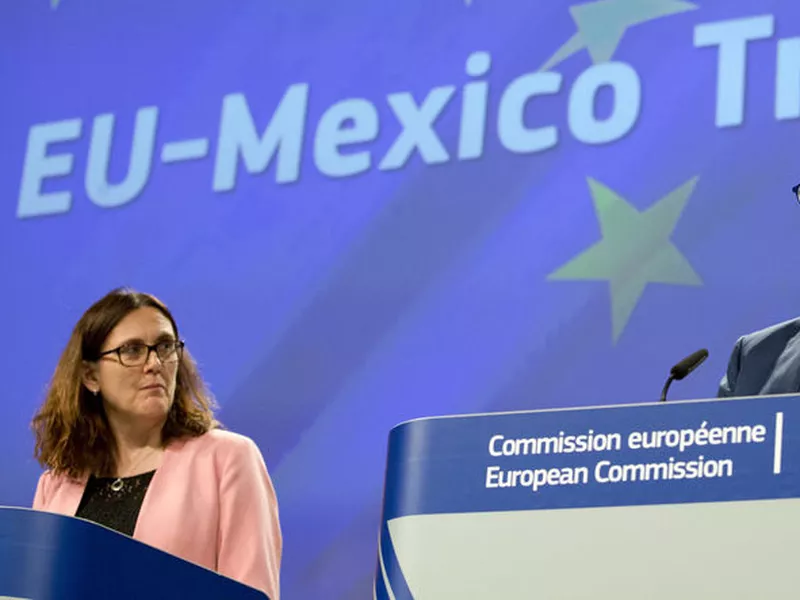 The European Trade Commissioner, Cecilia Malmstrom, left, and the European Commissioner for Agriculture, Phil Hogan, participate in a press conference at the EU headquarters in Brussels.