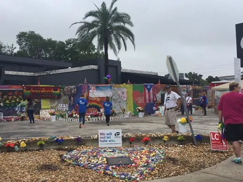 A makeshift memorial continues to grow outside the Pulse nightclub, the day before the one month anniversary of a mass shooting, in Orlando, Fla. (Photo: AP)