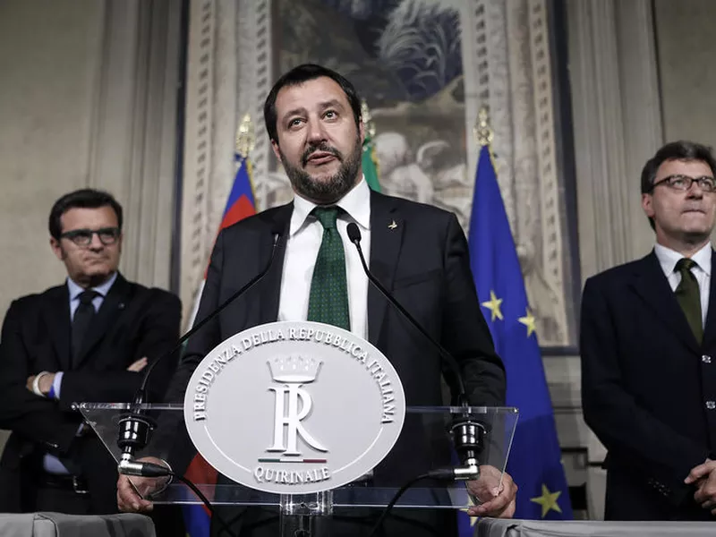 Leader of the League party, Matteo Salvini, center, addresses the media after a meeting with Italian President Sergio Mattarella at the Quirinale presidential Palace, in Rome.