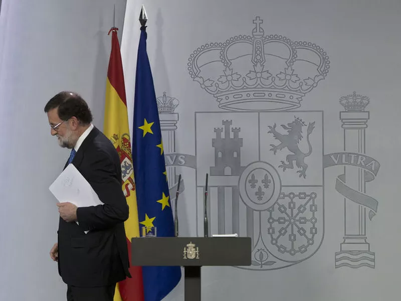 Mariano Rajoy leaves after a news conference in Madrid, Spain.