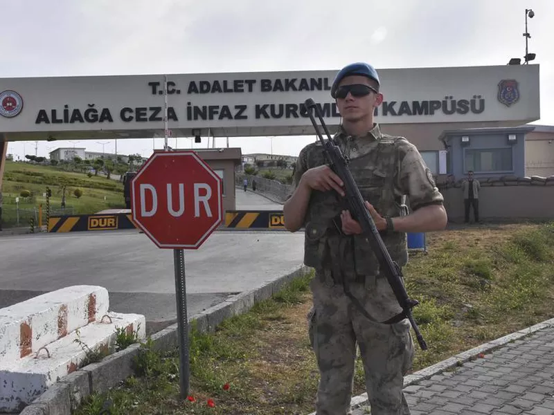 A Turkish soldier guards the entrance to the prison complex in Aliaga, Izmir province, western Turkey, where jailed US pastor Andrew Craig Brunson is appearing on his trial at a court inside the complex. (AP)