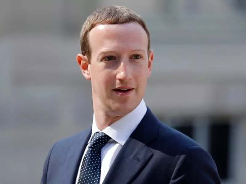 Facebook’s CEO Mark Zuckerberg, left meets with French President Emmanuel Macron at the Elysee Palace after the “Tech for Good” summit,
in Paris.