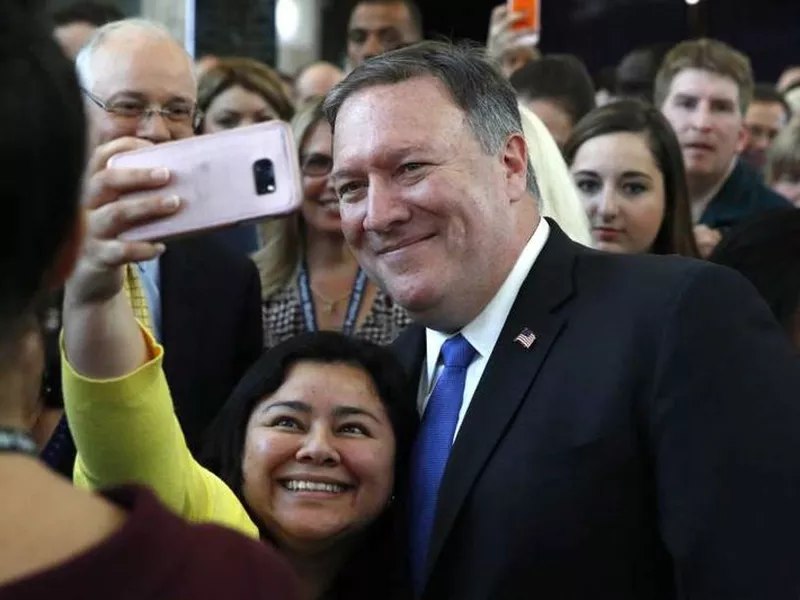 New Secretary of State Mike Pompeo greets State Department employees as he arrives at the State Department in Washington. (AP)