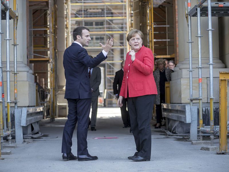 Emmanuel Macron, and German Chancellor Angela Merkel.