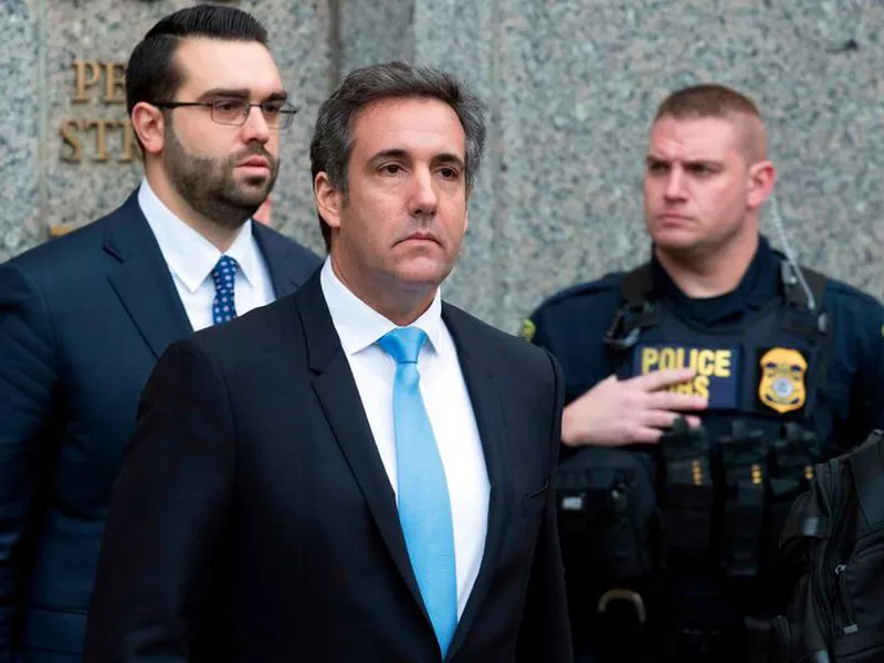 Michael Cohen, President Donald Trump’s personal attorney, center, leaves federal court, in New York.