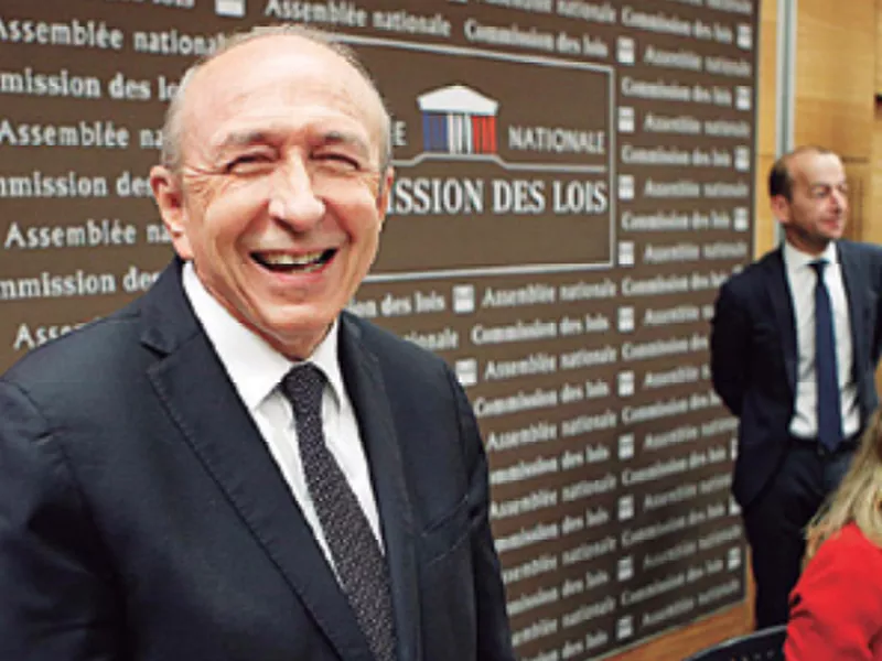 French Interior Minister Gerard Collomb, left, arrives for a hearing with the deputies of the Laws Commission concerning the case of President Macron’s security aide Alexandre Benalla.