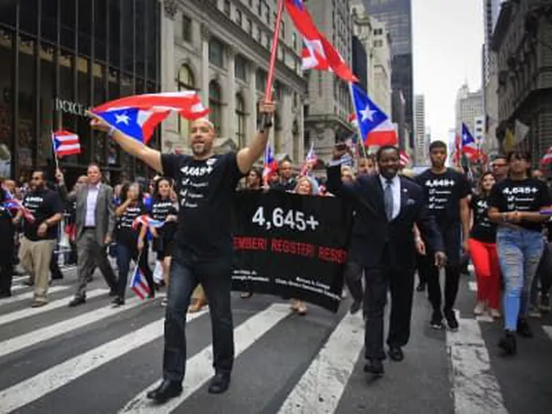 Bronx Borough President Ruben Diaz, center, leads a group of state and city officials during the Puerto Rican Day Parade, in New York.